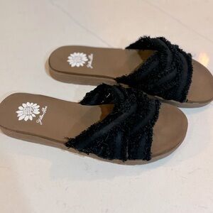 Yellow Box Size 7 slide in sandals.  Cloth/fuzzy straps. Like new rarely worn.